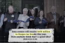 screenshot of tv ad with people at ribbon cutting with text over screen
