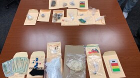 Some of the drugs and crash seized in a joint Ventura County-DEA drug smuggling operation. Five people were arrested.