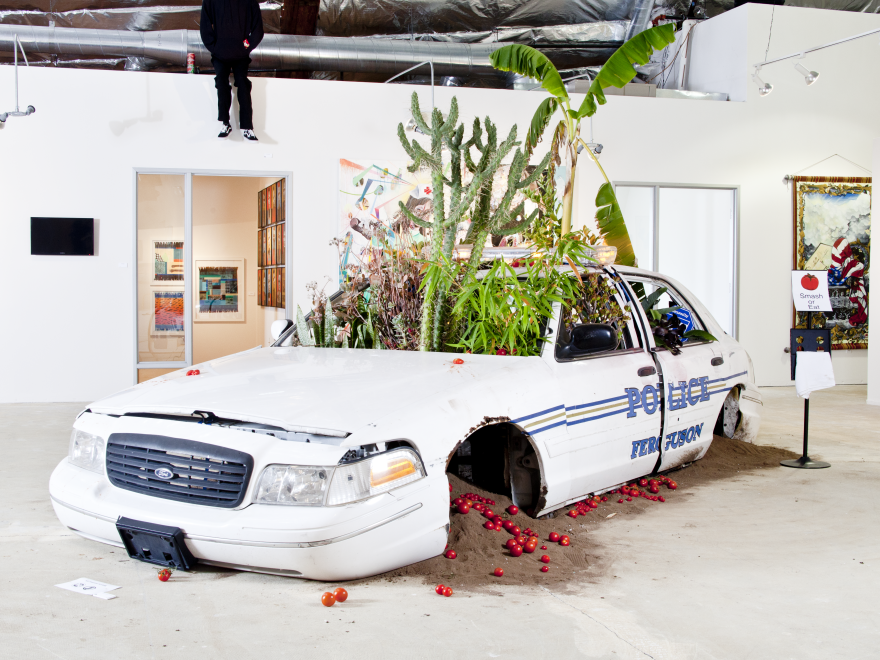  Social and environmental justice artist Jordan Weber links social and environmental justice together. His 2014/2015 piece with artist Ron Finely, American Dreamers Phase 2, (above) features a deconstructed police car with a community garden growing from it inspired by the Ferguson Uprising.  Weber's latest project is inspired by the Close The Workhouse campaign.