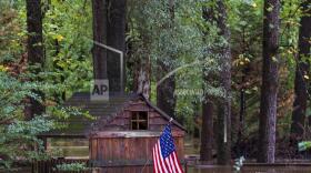 Floodwaters surround a structure Friday, Sept 27, 2024, in Atlanta. (AP Photo/Jason Allen)