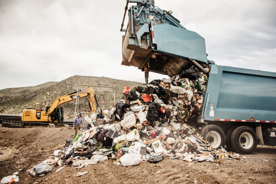 The first load of trash is dumped into a new section of the Pitkin County Landfill on June 3. County officials expect the expansion will extend the life of the landfill another six to eight years.