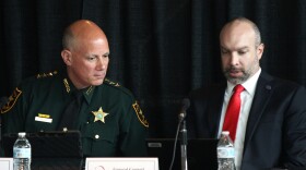 Pinellas Country Sheriff Bob Gualtieri speaks to Jason Jones, general counsel for the Florida Department of Law Enforcement, during a meeting of the Marjory Stoneman Douglas High School Public Safety Commission at the BB&T Center in Sunrise.