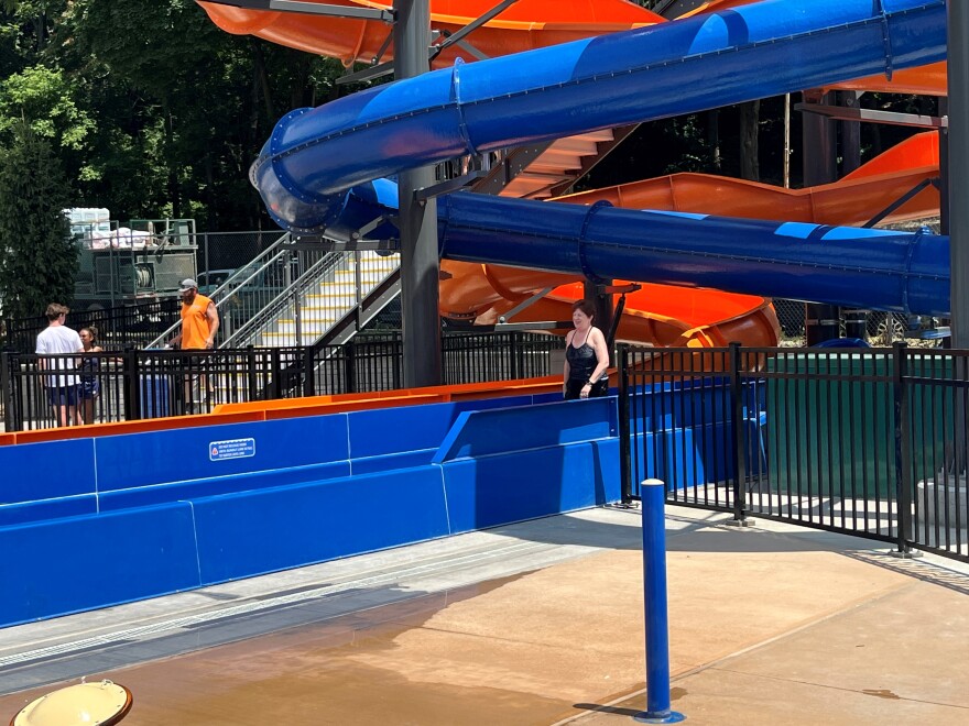 Mayor Kathy Sheehan emerges from the waterslide at Lincoln Park Pool on Grand Opening day, July 3, 2025.