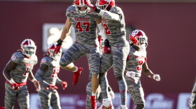 Indiana's Micah McFadden (47) and Jamar Johnson celebrate an interception by McFadden against Maryland Nov. 28 at Memorial Stadium.