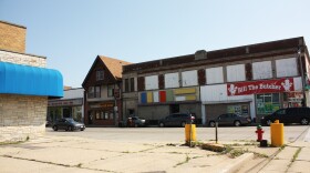 an empty lot beside a busy street