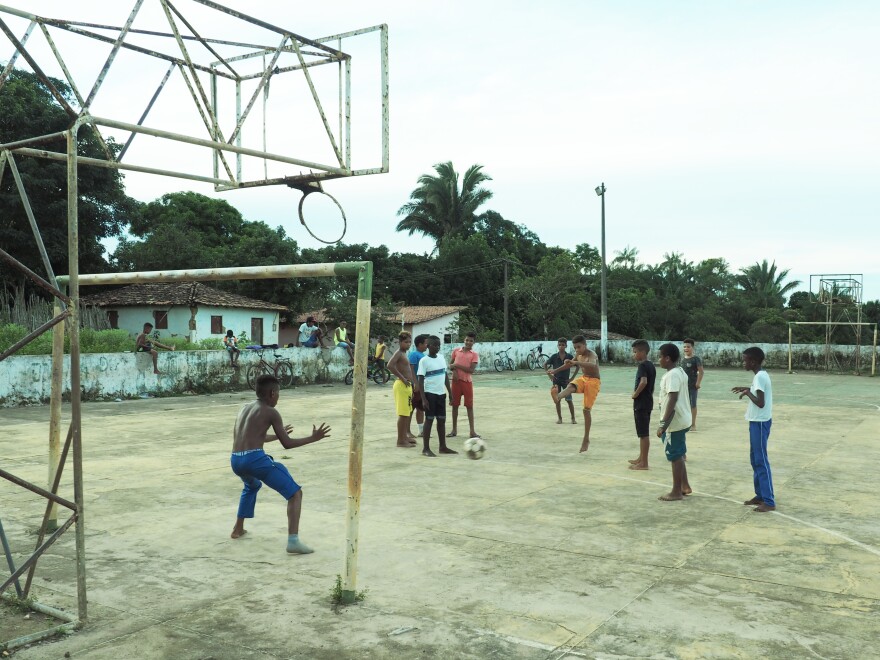 Young residents of Central play a pickup soccer game.