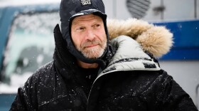 Iditarod musher Jim Lanier at the 2020 Iditarod Trail Sled Dog Race ceremonial start in Anchorage Saturday, March 7, 2020. (Joey Mendolia/Alaska Public Media)