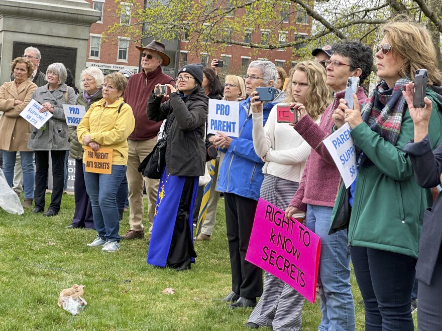 Supporters of a bill to create a "parents' bill of rights" attend a rally outside the New Hampshire Statehouse on Tuesday, April 18, 2023, in Concord, N.H. The rally was held ahead of a public hearing on the bill in the House Education Committee.