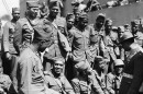 Black chaplain talking to troops on way to fighting zone on August 3, 1942. (AP Photo)