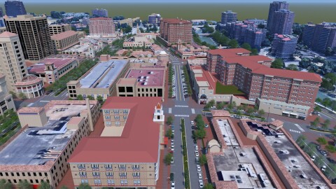 an above view of the proposed developments to the plaza showing the height difference of the old and new buildings, wider streets, and angled parking