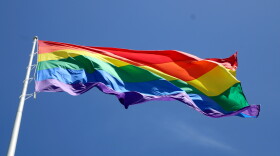A Pride flag billows in San Francisco's Castro district