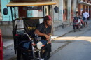 Liexer De La Cruz awaits customers in Campo Florido, Cuba's Havana province, Friday, Sept. 4, 2026. (AP Photo/Ramon Espinosa)
