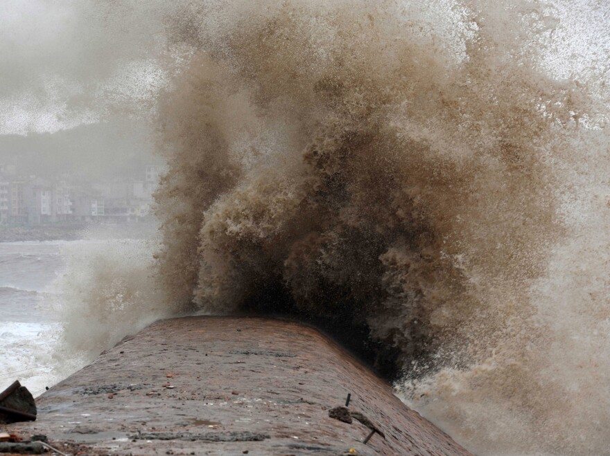 Huge typhoon-driven waves surge up the coastline of Huangqi Peninsula in China's eastern Fujian province on Saturday.