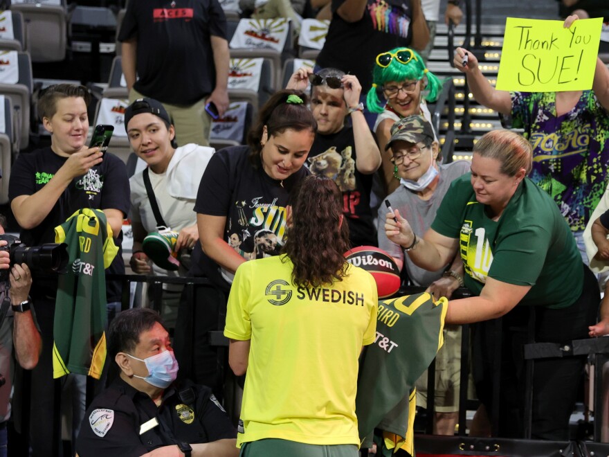 Bird signs autographs for fans  before Game Two of the 2022 WNBA Playoffs semifinals in August.