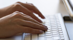 FILE - A person types on a keyboard on June 6, 2024, in Portland, Ore. (AP Photo/Jenny Kane, File)