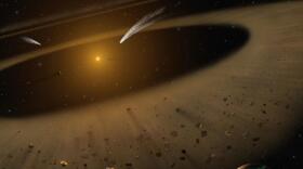 Artist's illustration of the Epsilon Eridani system showing Epsilon Eridani b, right foreground, a Jupiter-mass planet orbiting its parent star at the outside edge of an asteroid belt. In the background can be seen another narrow asteroid or comet belt plus an outermost belt similar in size to our solar system's Kuiper Belt. The similarity of the structure of the Epsilon Eridani system to our solar system is remarkable, although Epsilon Eridani is much younger than our sun. SOFIA observations confirmed the existence of the asteroid belt adjacent to the orbit of the Jovian planet.