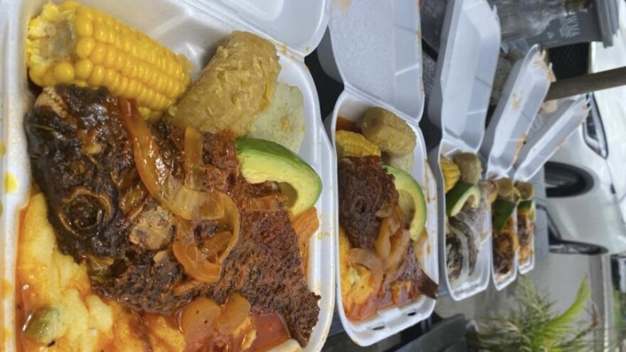 Fish and fungi being sold by Chef Buddy on St. Croix.