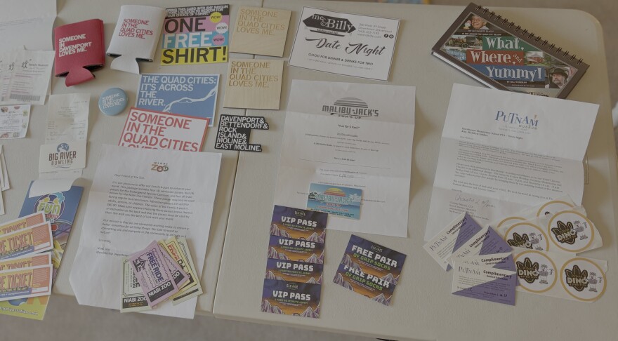 The Quad Cities package in the online auction features passes and other items from the Putnam Museum, Niabi Zoo, and Raygun, among many others.