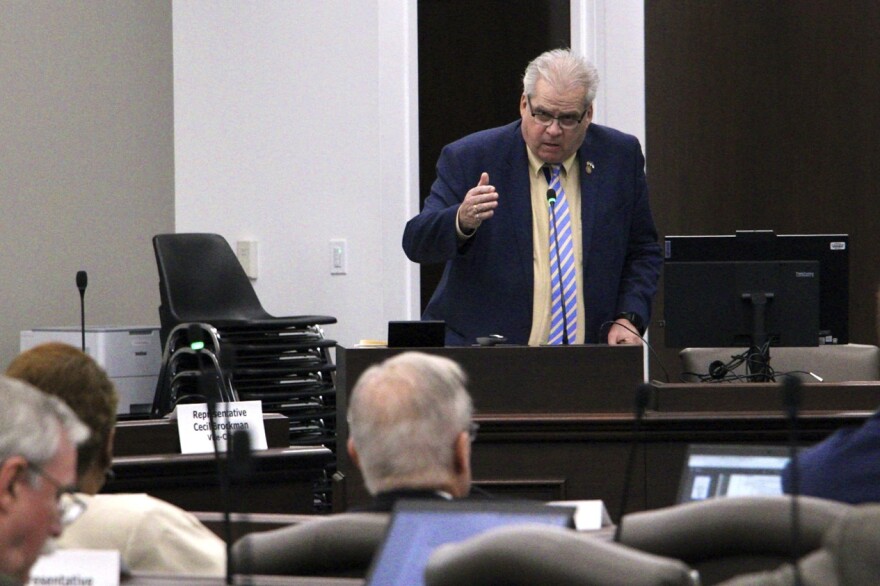 FILE - State Rep. John Torbett, R-Gaston County, answers questions about his bill to limit how teachers can discuss certain racial topics during a House Education Committee meeting at the Legislative Office Building in Raleigh, N.C., March 14, 2023. As the North Carolina legislative session winds down for the summer and budget negotiations plod along, House Republicans are proposing an eleventh-hour overhaul of public education laws that would take power away from superintendents and the State Board of Education while giving parents and lawmakers more control. (AP Photo/Hannah Schoenbaum, File)