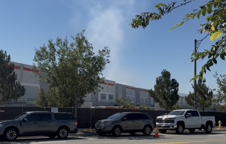 Flames are still smoldering at the Kimberly-Clark warehouse in Ontario that was burned down a month ago in an arson fire. Ontario officials say demolition preparations are underway at the former paper distribution center. But residents are concerned about the smoldering.