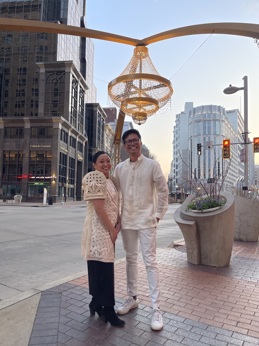 Filmmaker Michele Josue and producer Carlo Velayo in Downtown Clevland wearing traditional Filipino formalwear after the Nurse Unseen world premiere.