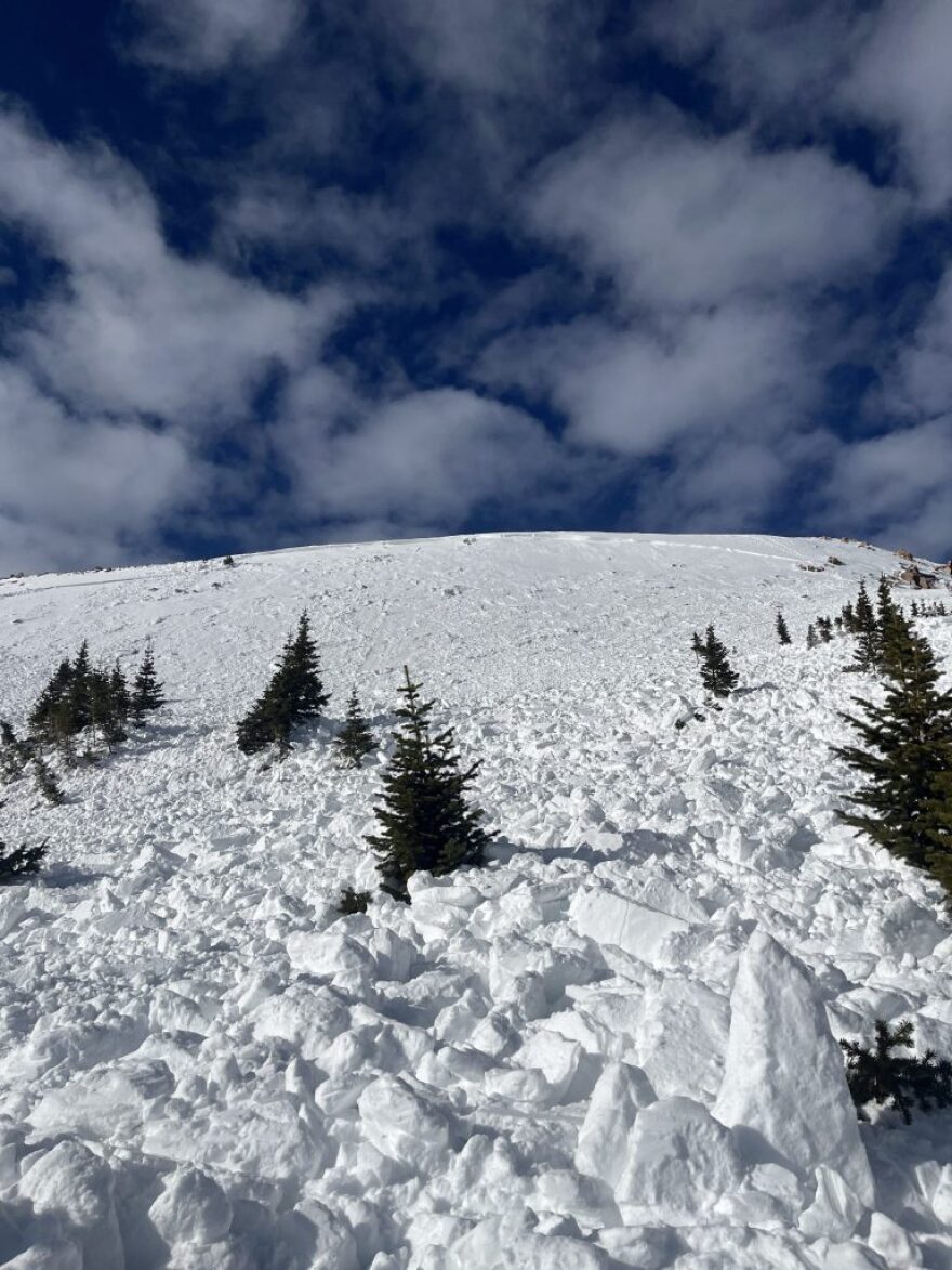 A photo taken from the base of the debris field shows the crown of the avalanche on Berthoud Pass on Jan. 18.
