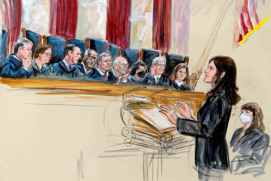 This artist sketch depicts Center for Reproductive Rights Litigation Director Julie Rikelman speaking to the Supreme Court, Wednesday, Dec. 1, 2021, in Washington.