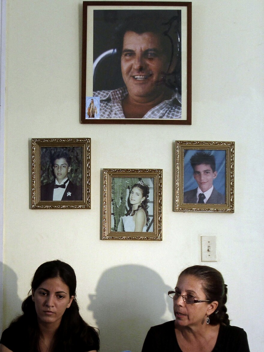 Ofelia Acevedo (right), the widow of Oswaldo Paya, and her daughter Rosa Maria Paya hold a news conference in Havana earlier this month. Acevedo says she doesn't believe her husband's death was an accident.