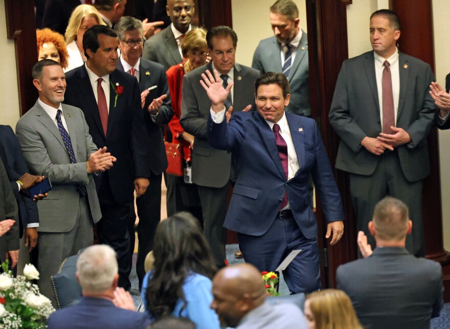 Gov. Ron DeSantis enters the Florida House of Representatives to give the State of the State Address in Tallahassee, Fla., on Tuesday, March 4, 2025. (Libby Clifton/Fresh Take Florida)