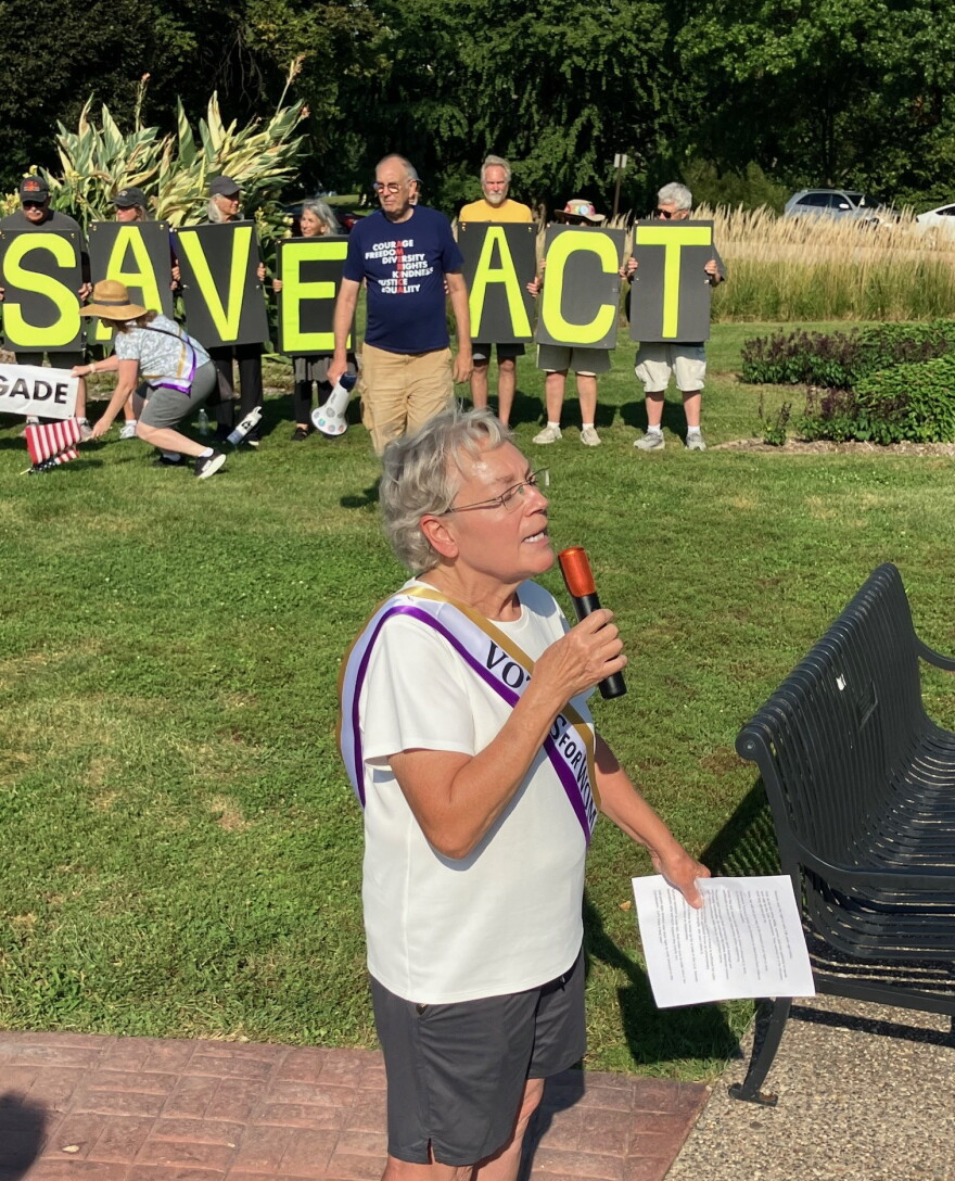QC NOW president Leslie DuPree spoke Wednesday at Davenport's Vander Veer Park, on Women's Equality Day, about the importance of opposing the federal SAVE Act.
