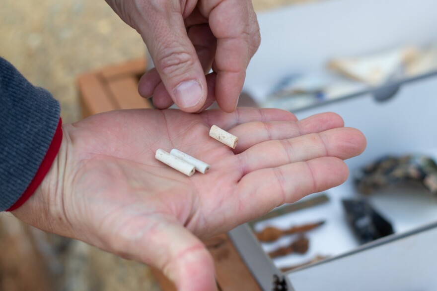 Several types of smoking devices were found at the site, including these fragments of delicate kaolin pipe stems.