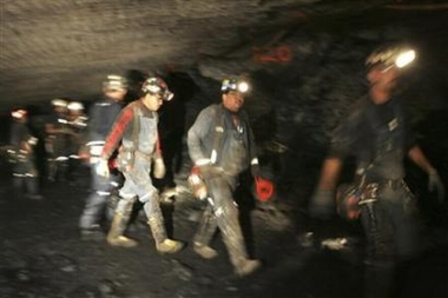 Workers attempt to reach trapped miners in the Crandall Canyon Mine August 7, 2007.