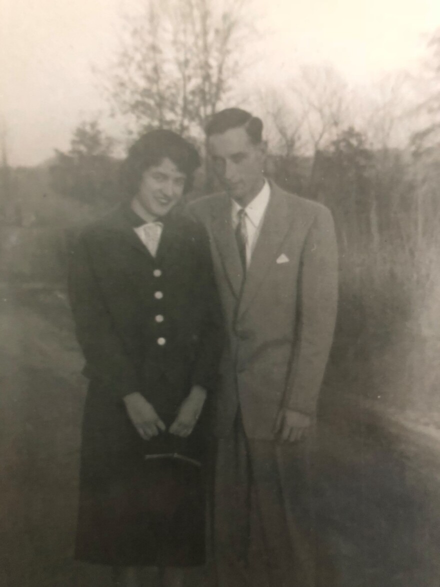 The couple in 1955, posing at their first wedding.