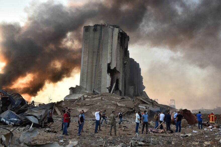 The blast destroyed a silo at the port in Beirut. Several hours after the blast, emergency crews still had not been able to reach all of the wounded people in their homes, the Lebanese Red Cross said.