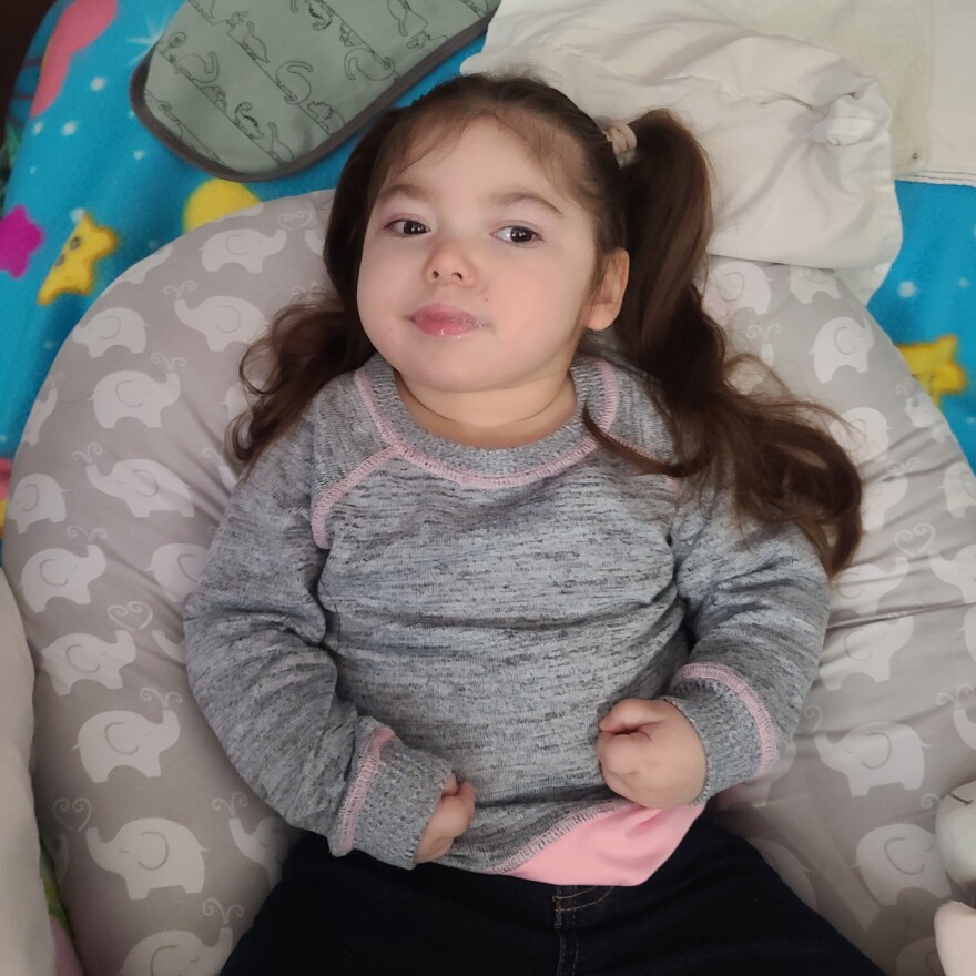 Elizabeth Zakutansky of Hobart, Indiana, was born with a rare genetic condition that causes multiple seizures. Her health care is covered by Medicaid, but the program pays out-of-state doctors and hospitals less than those in Indiana, forcing the family to pay out-of-pocket for some of her care.