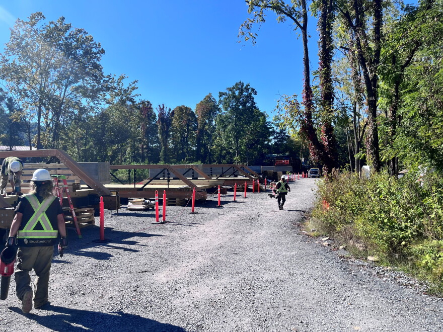 Kiewit workers are working on a site along the Virginia Creeper Trail outside Damascus.