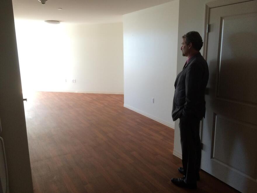 Beyond Housing's Chris Krehmeyer stands in a vacant unit inside Rosie Shields Manor in Pagedale. Krehmeyer's group has developed a number of projects using the low-income housing tax credit.