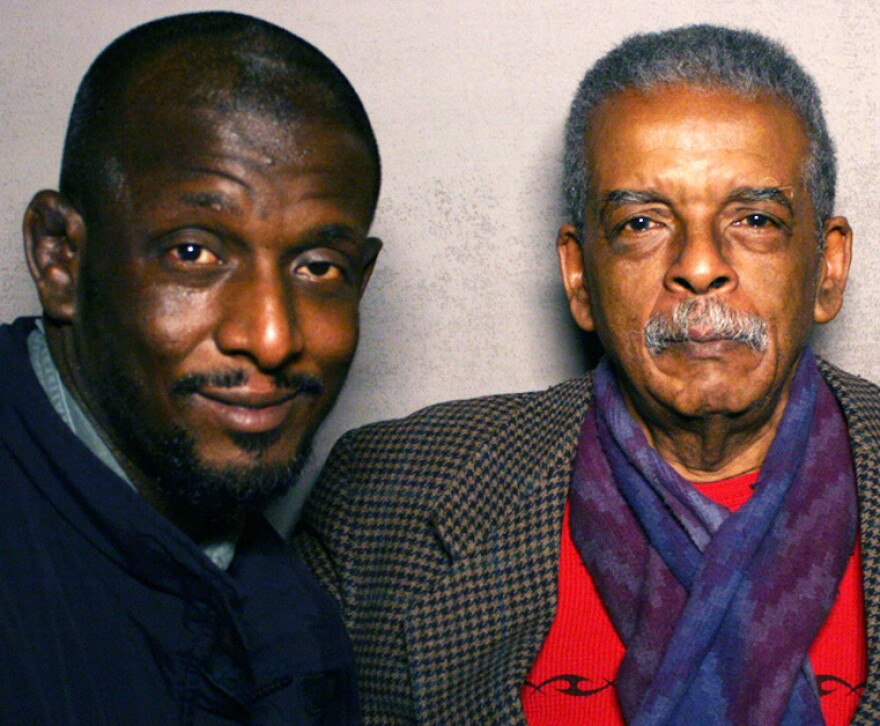 Lawrence (right) recounted his 1963 walk from New York to Washington, D.C., to his son, Simeon, on a visit to StoryCorps.