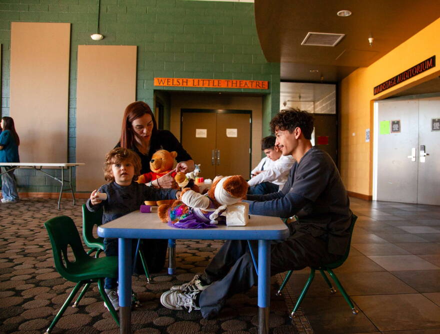 Teddy bear clinic bandaging
