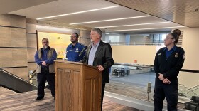 Billings Director of Aviation Jeff Roach speaks at Billings Logan International Airport Tuesday. TSA Federal Security Director for Montana KC Wurstbaugh stands on the far left.