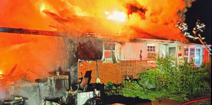 Flames shoot from a home in the 3200 block of Mt. Vernon Avenue in Evansville, Aug. 5, 2026