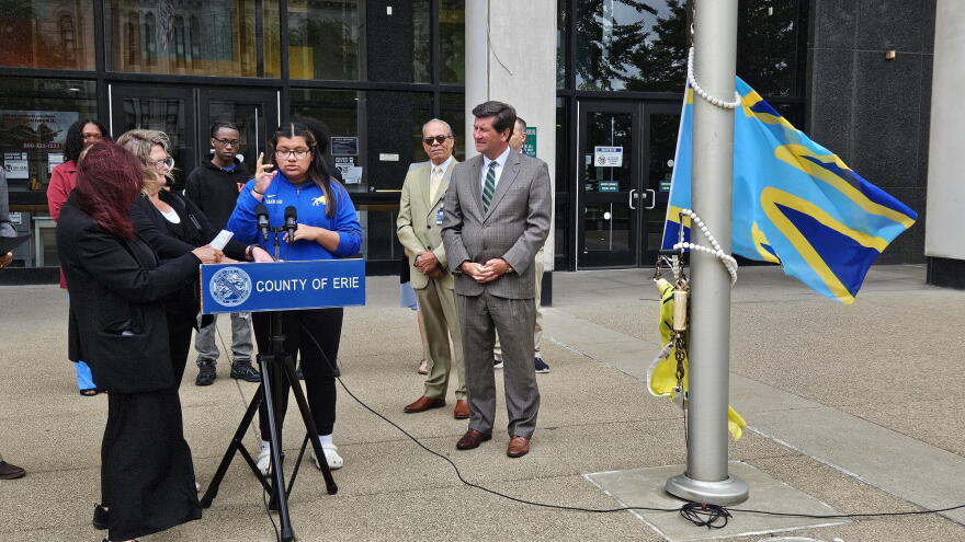 St. Mary’s School of the Deaf student Yhindi Garcia, in blue, uses sign language to describe the impact of International Deaf Awareness Week.