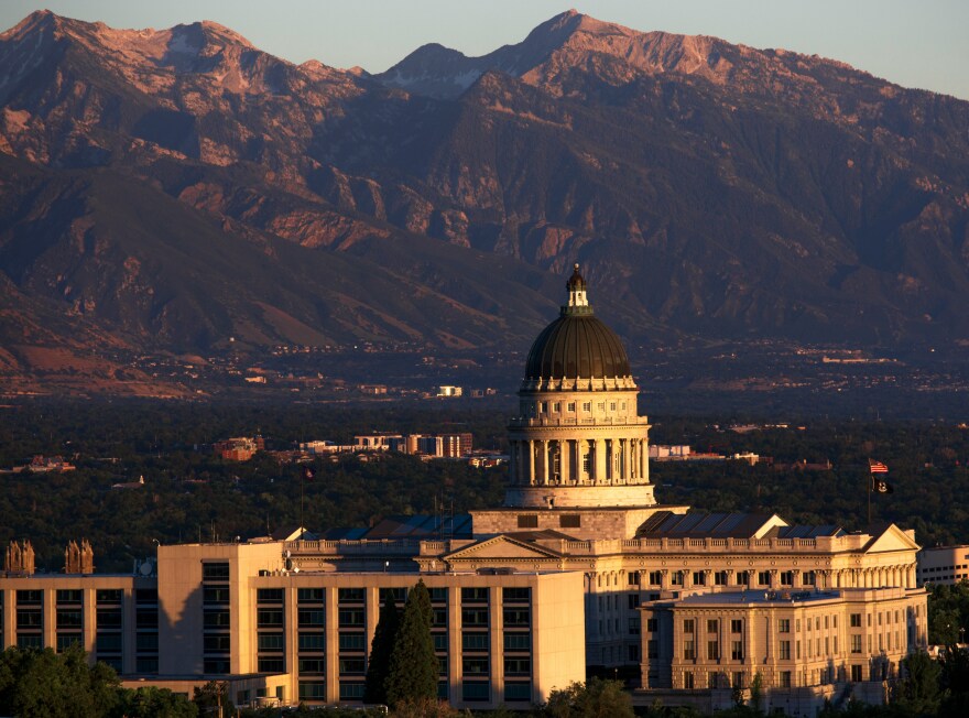 The Utah state capitol is backed by mountains. 