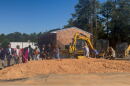 Homeless No More President and CEO Lila Anna Sauls, representatives from United Way of the Midlands and the South Carolina State Housing Finance and Development Authority, and other community leaders break ground at Grand Village in Columbia on Oct. 13.