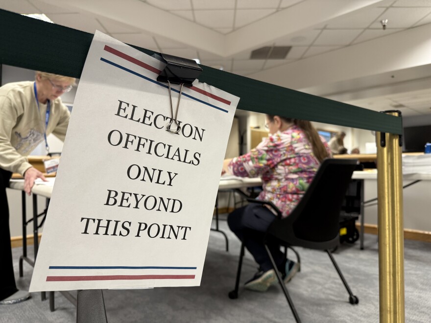 A small sign marks the barrier between election workers and the public viewing area as the new hand count audit got underway Oct. 8, 2025.