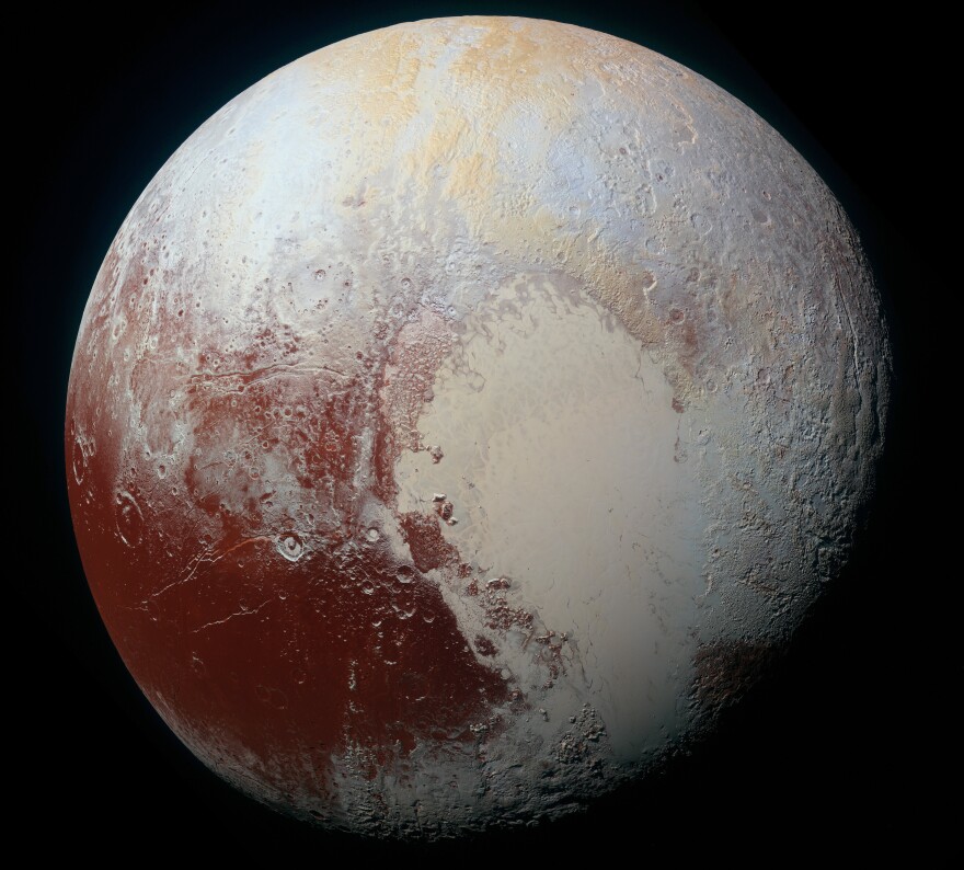 A high-resolution "false color" view of Pluto shows the dwarf planet's surface composition. New analysis shows that some of the bright red areas also include frozen water.