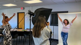 Rebeca Carrasquillo (left) is helping her mentee Esmeraida Figueroa (right) with her poses for a photoshoot with Big Brothers Big Sisters of Connecticut on September 19, 2026. The pair were photographed for a feature in the organization's 2026 Annual Report.