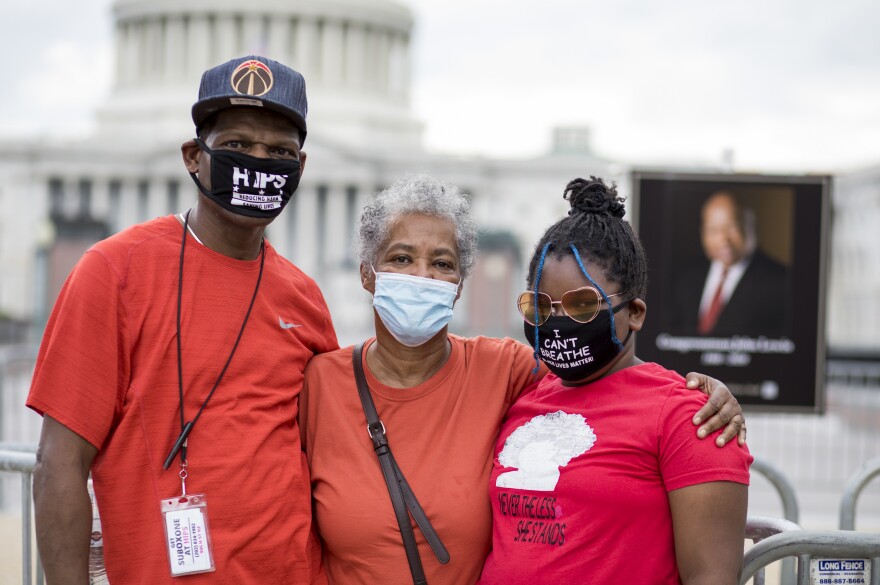 Joan Taylor, middle, is with her nephew, Randy Kier, left, and her great granddaughter, Leah Miller, right.