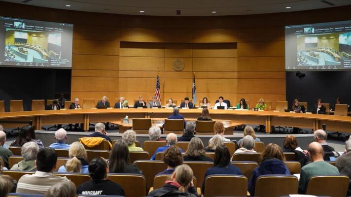 People attend a Senate committee hearing in March 2026 at the Minnesota State Capitol on a bill requiring additional public hearings and disclosures before approving data center projects in Minnesota.