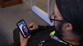 Jason Ramsey connects to a virtual counseling session with Dr. Emily Ware from the Medical University of South Carolina.